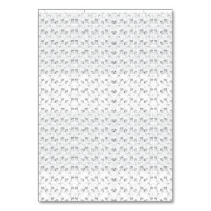 Repeating pattern of small, stylised shapes on a w table number