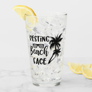 Resting beach face words glass