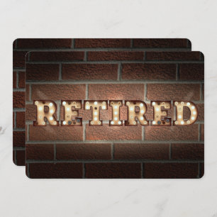 Retired sign in marquee lights on brick invitation