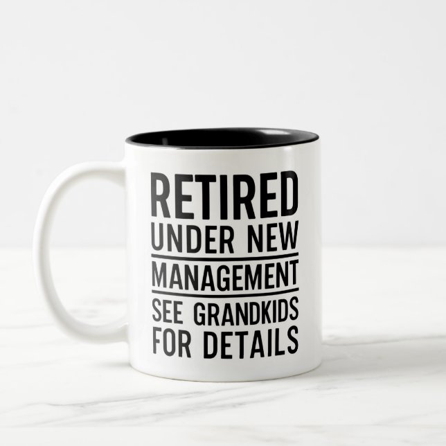 Retired Under New Management See Grandkids Two-Tone Coffee Mug (Left)
