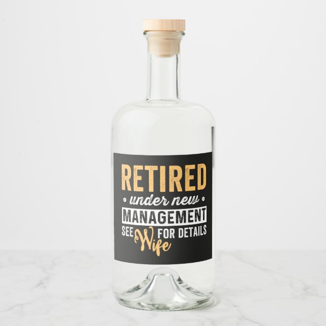 retired under new management see wife for details. liquor bottle label (Front)