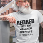 Retired Under new Management See Wife T-Shirt<br><div class="desc">This design was created though digital art. You may change the style of this shirt by choosing More > under the style option. It may be personalised by clicking the customise button and changing the colour, adding a name, initials or your favourite words. Contact me at colorflowcreations@gmail.com if you with...</div>