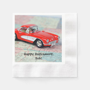 retirement-red corvette sports car on road map napkin