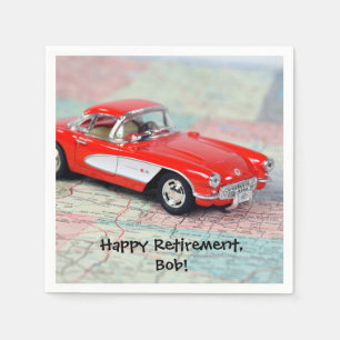 retirement-red corvette sports car on road map napkin