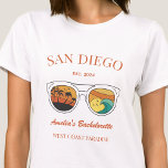 Retro Beach Bachelorette Party Girls Trip Custom T-Shirt<br><div class="desc">Make a splash at your upcoming bachelorette party with this stunning beach bachelorette party personalised t-shirts. Whether you're celebrating a bach trip, a girls' vacation, or a best friends' holiday, this custom beach bachelorette party t-shirts are the perfect addition to your unforgettable getaway. Add a personal touch to your bachelorette...</div>