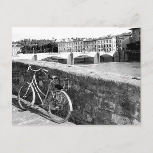 Retro Bicycle next to a bridge in Florence Postcard
