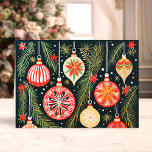Retro Christmas Ornaments and Pine Branches Holiday Card<br><div class="desc">Celebrate the season with our Retro Christmas Ornaments and Pine Branches Holiday Card! This charming card features a vibrant illustration of vintage-style ornaments hanging from pine branches, set against a dark, festive background. Perfect for sharing joyful holiday wishes, this card captures the nostalgic and cheerful spirit of Christmas. The inside...</div>