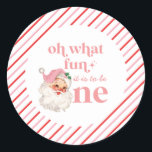 Retro Christmas pink Santa First Birthday Classic Round Sticker<br><div class="desc">Retro Christmas Santa first birthday party with retro style pink santa and pink and red stripes. Oh what fun it is to be one!</div>