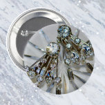 Retro Glam Vintage Art Deco Rhinestones 6 Cm Round Badge<br><div class="desc">Add some retro glam style with these vintage artdeco rhinestone earrings on a pin-back button. It's a fun way to add elegance and glamour with this glamourous and elegant art deco style pin back button. Silvery grey with hints of icy blue, it appears to sparkle. Ultra feminine and chic flair...</div>