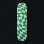 Retro Green And Blue Warped Chequered Chequerboard Skateboard<br><div class="desc">Trendy,  modern psychedelic retro distorted and warped chequerboard design. Seventies trippy warped checks for you. Chequered warped skateboard,  warped checks skateboard,  retro seventies chequered skateboard</div>