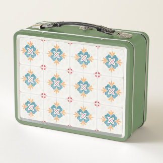 Retro green lunchbox with a floral tile pattern