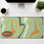 Retro Green Yellow Brown Marble Swirl Desk Mat<br><div class="desc">Immerse yourself in a dance of colours with our Abstract Retro Modern Liquid Marble Wave Pattern. Evoking the dynamic fluidity of marbled surfaces and the charming aesthetics of retro-modern design, this pattern is a feast for the eyes. A symphony of vibrant colours swirls and flows in wave-like motions, creating a...</div>