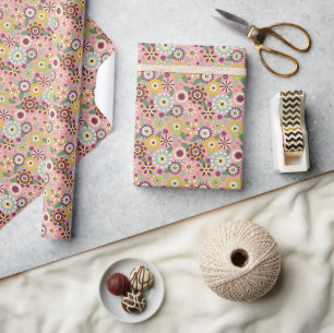 Retro groovy 70s floral pattern on pink wrapping paper