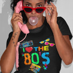 Retro I Love The 80s | Eighties T-Shirt<br><div class="desc">Get ready to rock the night away with this one-of-a-kind fun and colorful 80's t-shirt! The neon text,  cassette tapes,  retro sunglasses,  ghetto blaster,  and scattered stars will make for an unforgettable outfit,  perfect for your next retro party. Don't miss out on adding this iconic piece to your wardrobe!</div>