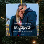 Retro Our First Christmas Engaged Photo Ceramic Ornament<br><div class="desc">A modern typography for this photo ornaments collection for newly engaged couples. To customize with your favorite picture. You can also easily change the color of the font to your liking.</div>