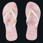 Retro Pink Daisy Flip Flops for Bridesmaids<br><div class="desc">Step into retro summer in style with these personalised Ditzy Daisy flip flops! The light pink flip flops feature a playful and nostalgic daisy pattern, perfect for adding a touch of fun to any bachelorette or wedding celebration. The white straps are comfortable and durable, making them ideal for a day...</div>