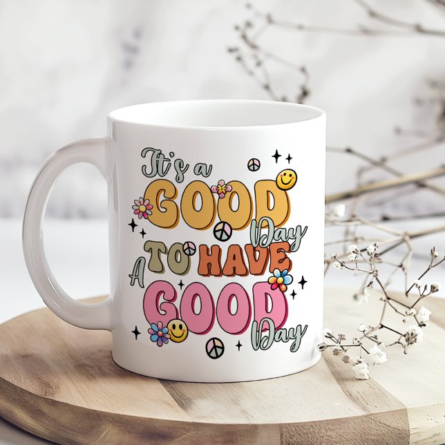 Retro Positivity "It's a Good Day" Coffee Mug (Retro Positivity "It's a Good Day" Coffee Mug on a boho table with tiny dry white flowers)