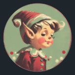 Retro Santa's Elf Vintage Christmas Classic Round Sticker<br><div class="desc">This sticker features a cute little retro looking holiday elf in a Christmasy circular border The sticker is in green, cream and red and is very adorable indeed. This will be a nice vintage addition to a Christmas card, Christmas present or anything else you might put a holiday sticker on....</div>