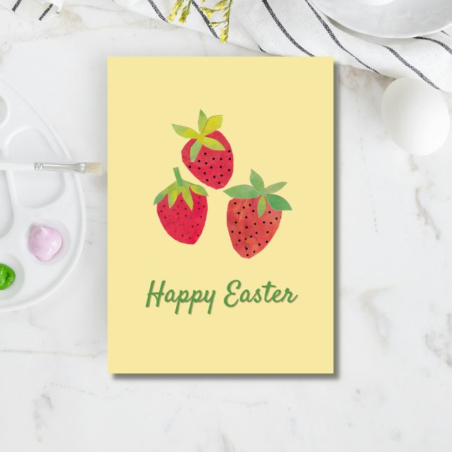 Retro Spring Strawberry Easter Folded Holiday Card (Three vibrant red strawberries appear over a retro "Happy Easter" all on a buttercream background.)