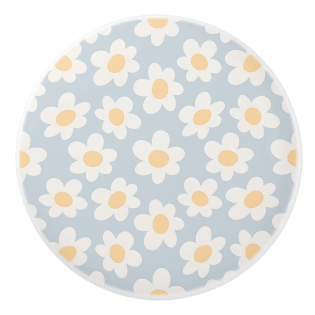 Retro style daisies in bloom on blue background ceramic knob (Front)