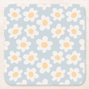 Retro style daisies in bloom on blue background square paper coaster