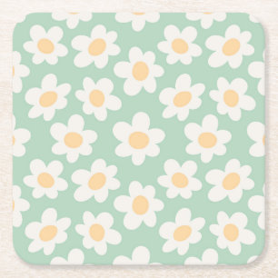 Retro style daisies in bloom on green background square paper coaster