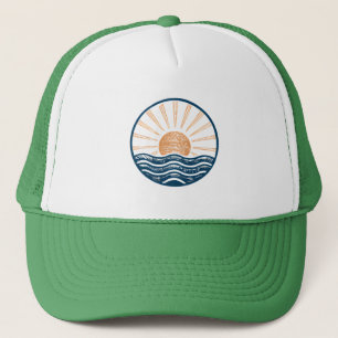 Retro sunset above the sea or ocean with sun and w trucker hat