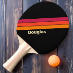 Retro VHS Striping with Name Ping Pong Paddle<br><div class="desc">Retro VHS Stripes Ping Pong Paddle, where nostalgia meets high-intensity gameplay. This paddle combines vintage aesthetics with modern performance, offering a unique and stylish experience on the ping pong table. With its eye-catching VHS stripes pattern, this paddle pays homage to the iconic video format of the past. The bold colours...</div>