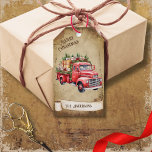 Retro Vintage Red Pickup Truck Merry Christmas Gift Tags<br><div class="desc">Beautiful retro vintage illustration of a red pickup truck loaded with Christmas Trees and gifts and on a retro grunge background and frame for an aged or vintage look. Design features a vintage scroll ribbon for your personalisation both in the front or the back sides of this elegant, and timeless...</div>