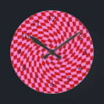 Retro Warped Red Pink Checks Chequered      Round Clock<br><div class="desc">Retro warped checks chequerboard design,  in red and pink combination. Retro chequerboard twirled seventies psychedelic style modern design home decor,  office,  and school products,  and retro warped chequered gifts.</div>