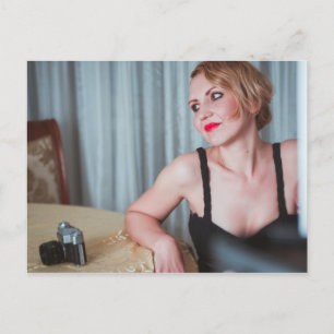 Retro woman with camera postcard