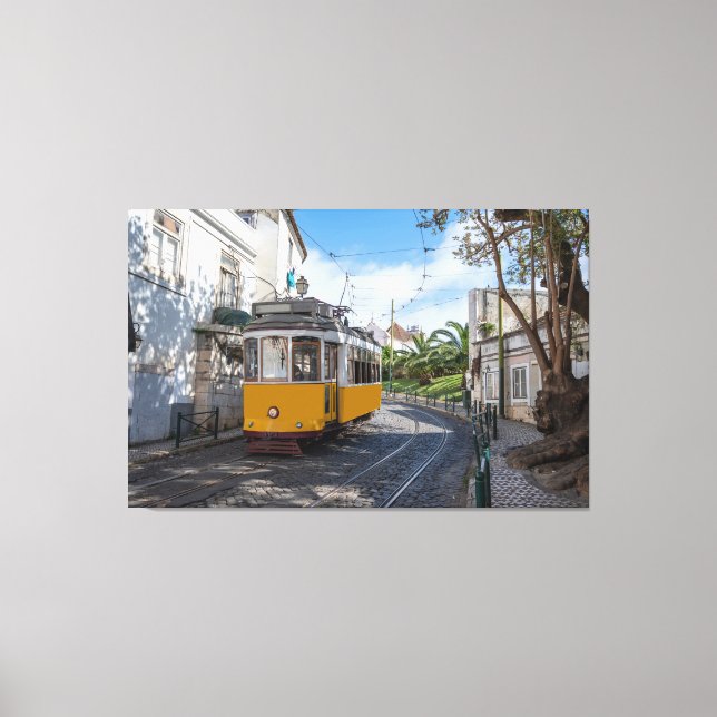 Retro yellow tram on street in Lisbon, Portugal Canvas Print (Front)