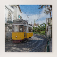Retro yellow tram on street in Lisbon, Portugal