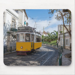Retro yellow tram on street in Lisbon, Portugal Mouse Mat