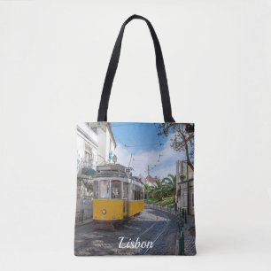 Retro yellow tram on street in Lisbon, Portugal Tote Bag