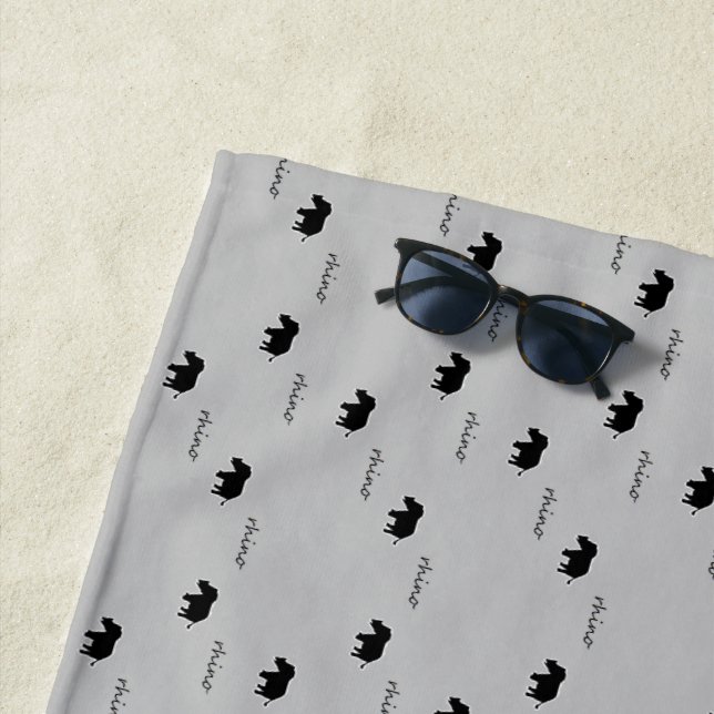 Rhino silhouette pattern beach towel (In Situ)