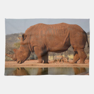 Rhino with mud on skin photo tea towel