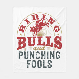 Riding Bulls and Punching Fools Fleece Blanket