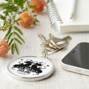 Rielaboration of Vintage Lions with Swirls Key Ring