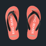 Ring Bearer NAME Coral Kid's Flip Flops<br><div class="desc">Ring Bearer is written in white text against bright coral colour with black accents. Name and Date of Wedding is turquoise blue. Personalise your little ring bear boy's name in arched uppercase letters. Click Customise to increase or decrease name size to fall within safe lines. Fun beach destination flip flops...</div>