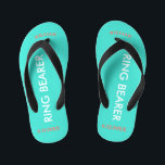 Ring Bearer NAME Turquoise Blue Kid's Flip Flops<br><div class="desc">Ring Bearer is written in white text against bright happy turquoise blue colour with black accents. Name and Date of Wedding is in coral text. Personalise your little ring bear boy's name in arched uppercase letters. Click Customise to increase or decrease name size to fall within safe lines. Fun beach...</div>