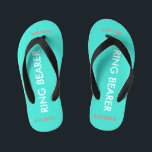 Ring Bearer NAME Turquoise Blue Kid's Flip Flops<br><div class="desc">Ring Bearer is written in white text against bright happy turquoise blue colour with black accents. Name and Date of Wedding is in coral text. Personalise your little ring bear boy's name in arched uppercase letters. Click Customise to increase or decrease name size to fall within safe lines. Fun beach...</div>