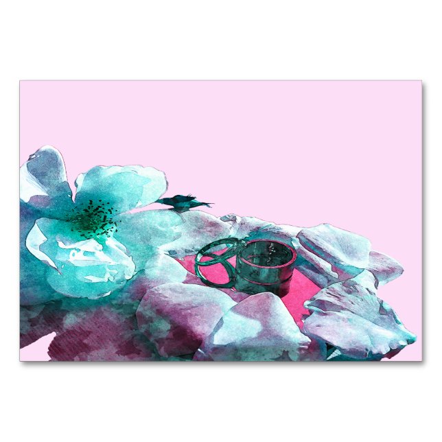 Rings with white rose petals table number (Front)