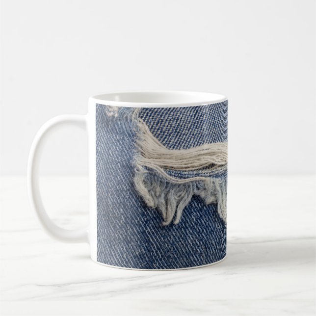 Ripped jeans texture, stylish background. coffee mug (Left)