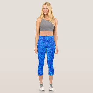 Ripples in a blue pool on capris