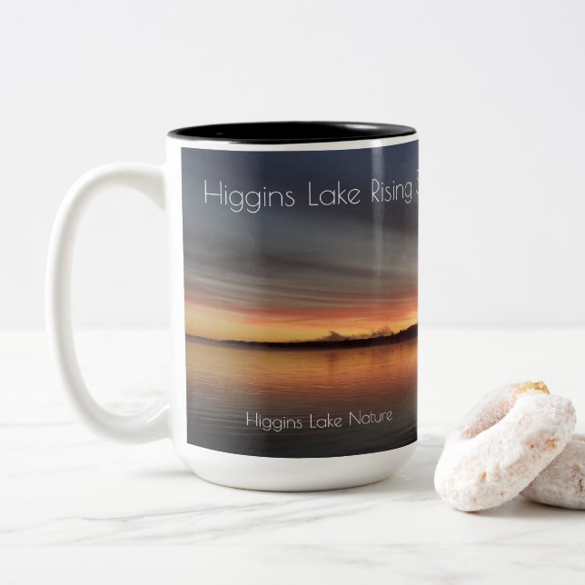 Rising sun at Higgins Lake, Michigan Two-Tone Coffee Mug (With Donut)
