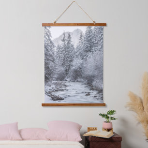 River flowin through snowy winter forest Mojstrana Hanging Tapestry