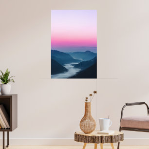 River of fog flowing through mountains at sunrise poster