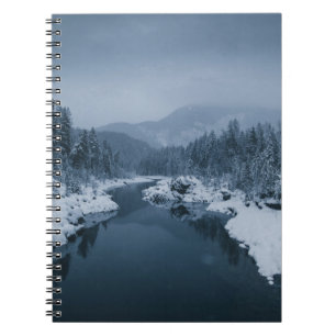 RIVER SURROUNDED BY SNOW COVERED FIELD WITH PINE T NOTEBOOK