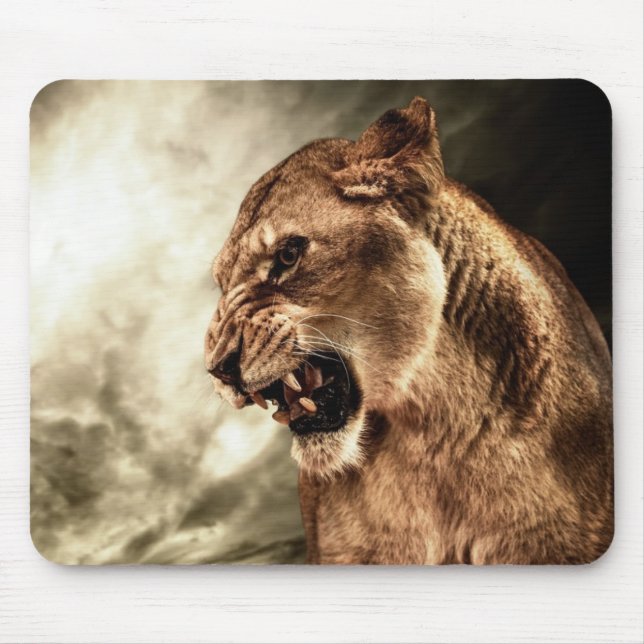 Roaring lioness against stormy sky mouse mat (Front)